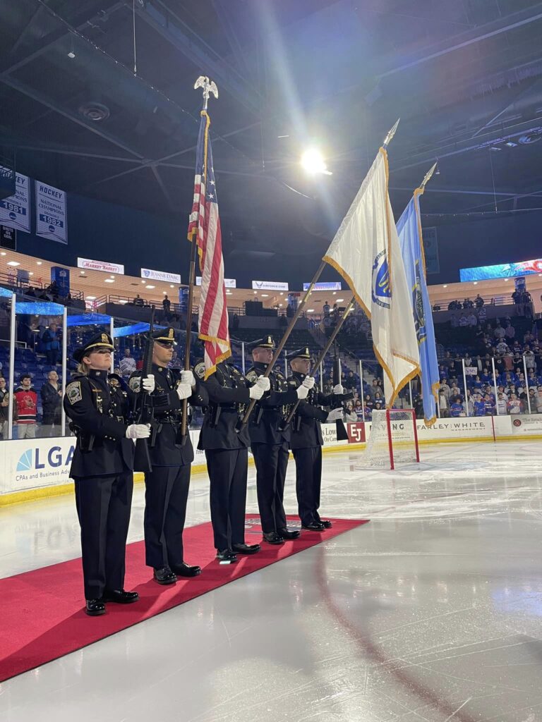 May be an image of 5 people, people playing hockey and text